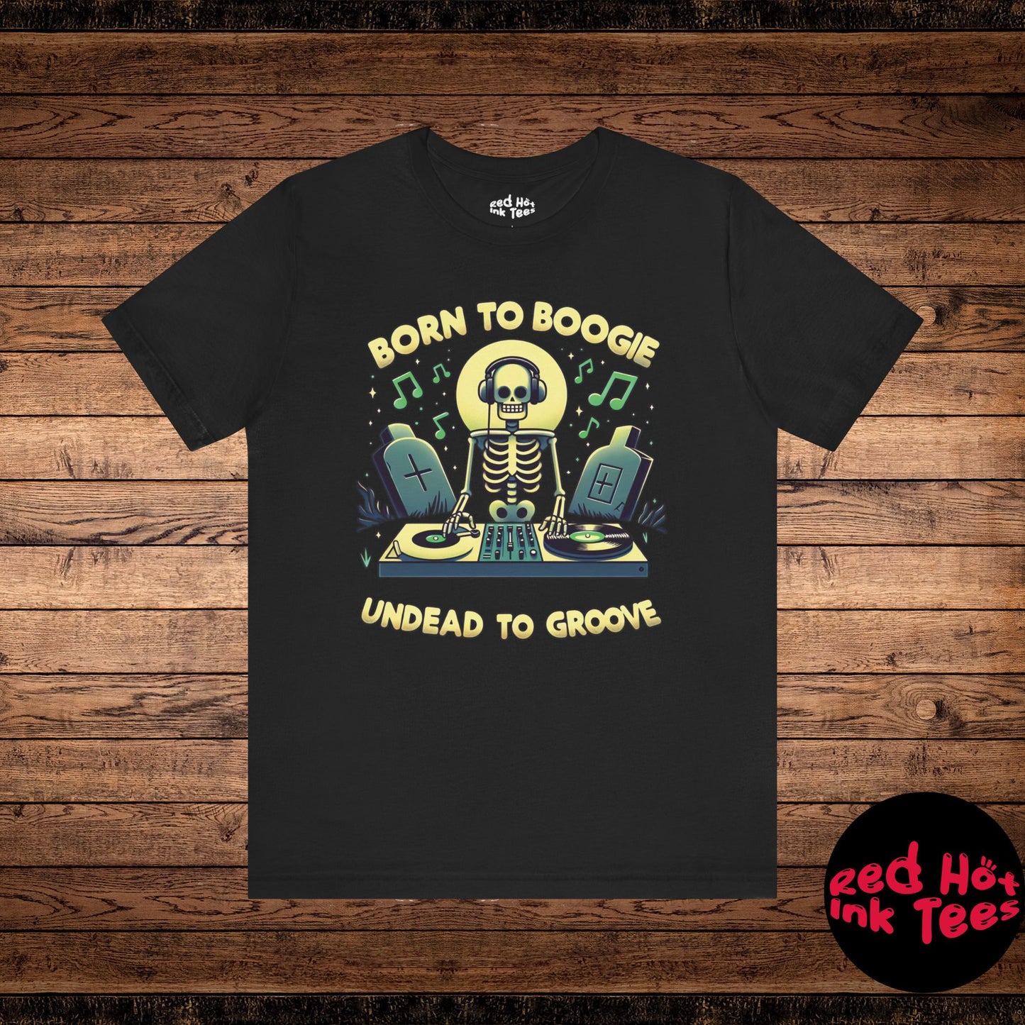 Fun Halloween design featuring a skeleton DJ spinning records in a graveyard with the phrase "Born to Boogie, Undead to Groove." Perfect for music lovers and those who enjoy spooky Halloween parties.