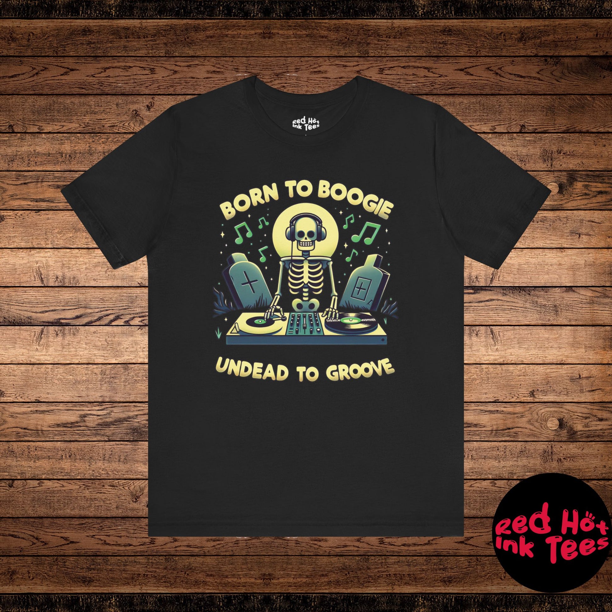 Fun Halloween design featuring a skeleton DJ spinning records in a graveyard with the phrase "Born to Boogie, Undead to Groove." Perfect for music lovers and those who enjoy spooky Halloween parties.