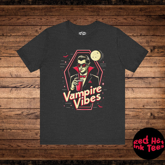 Stylish Halloween design featuring a suave vampire sipping a drink with the phrase "Vampire Vibes." Perfect for those who love cool vampire aesthetics and want to show off their Halloween spirit.