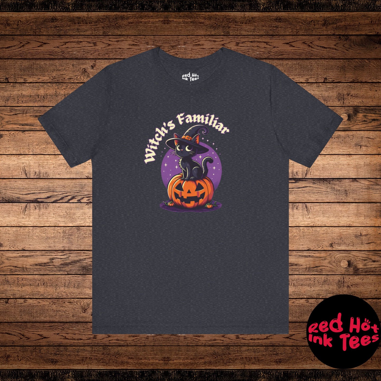 This cute Halloween design features a black cat wearing a witch's hat, sitting on a jack-o'-lantern, with the phrase "Witch's Familiar." Perfect for cat lovers and those who enjoy a playful yet spooky take on Halloween. Ideal for festive apparel or decorations during spooky season.