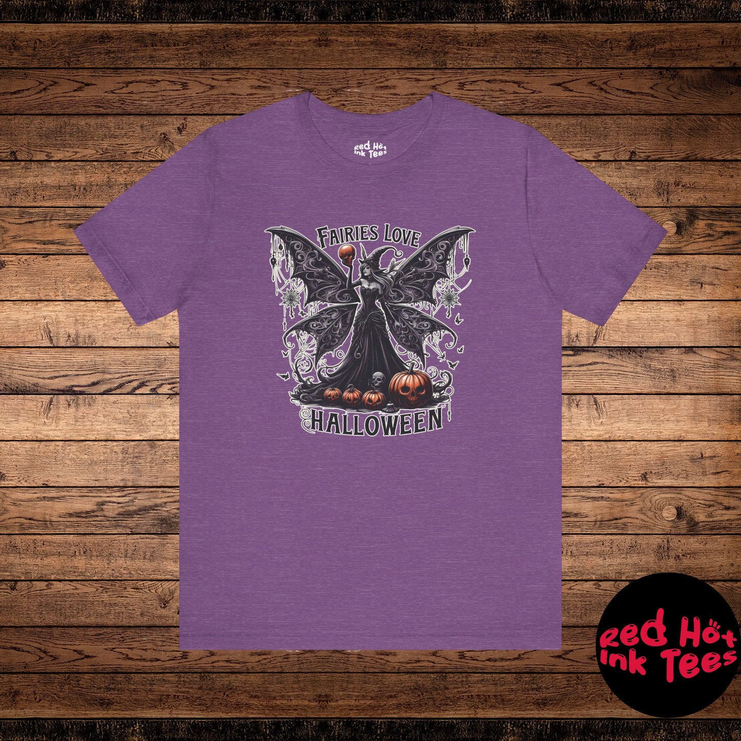 This Gothic Halloween design features a dark fairy with intricate wings, holding a skull, surrounded by jack-o'-lanterns and spooky elements. Perfect for fans of Gothic art and mystical creatures, this design is ideal for those who love the dark, enchanting side of Halloween. Great for spooky season apparel and decorations.