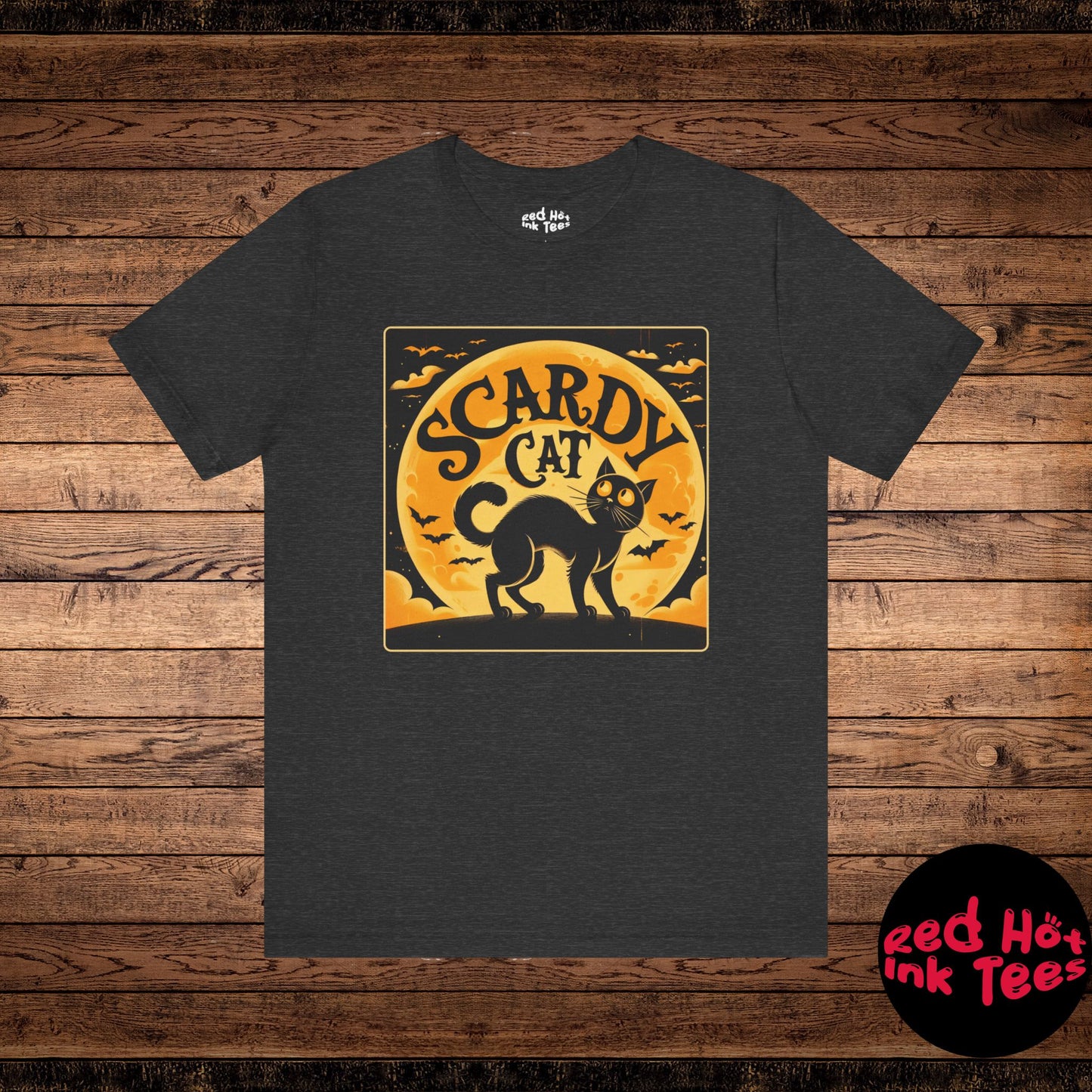 This vintage-inspired Halloween design features a black cat standing against a glowing full moon with the phrase "Scaredy Cat." Perfect for cat lovers and those who enjoy retro-style Halloween designs, this graphic is ideal for festive apparel or decorations during the spooky season.